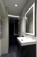Shower with dark decorative tiles