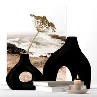 Ceramic vases with dry flower and candle