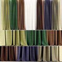 A set of curtains in different colors with tulle