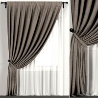 Narrow brown curtains in the background with tulle