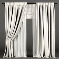 White curtains in the background with tulle and roman curtain