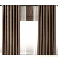 Dense dark brown curtains with brown tulle and roman curtains.