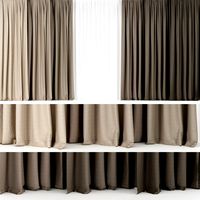 A series of brown curtains with tulle