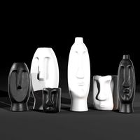 Vases in The Form of Idols
