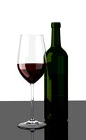 Glas of Red Wine with Bottle