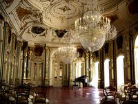 Baroque Hall With Piano And Chairs