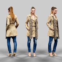 Woman in beige coat and scarf