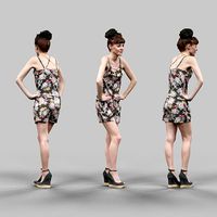 Fashion girl in flower pattern dress posing