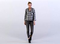 Janna 0375 Woman in a plaid shirt walking