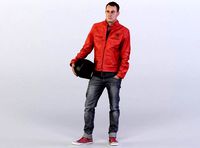 Lars 0067 Man in a leather jacket holding a helmet