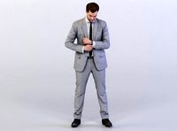 Joscha 0118 Man in a Suit fixing his Cuff