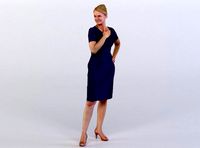Anna 0016 Woman in a blue dress standing