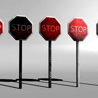 Five grungy and worn stop signs