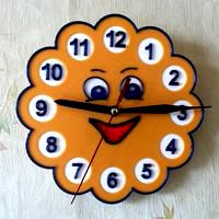 Wall clock in the children's room "Sun"