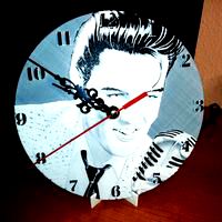 Reloj by pared Elvis Presley