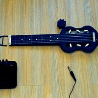Mini electric guitar for travel.
