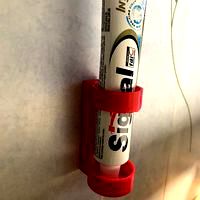 Toothpaste holder
