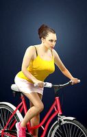 Dream Female Model Riding A Bicycle