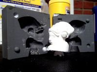 Parametric two-part mold generator for OpenSCAD by jasonwebb