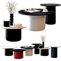 Button Tables and Joker Vases by BB Italia