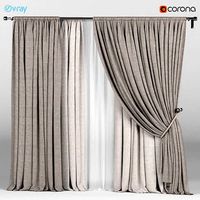 Wide brown curtains with a garter on a rope with white tulle