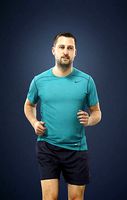 Portrait Sportswear Casual Man in Shorts Running Jogging