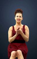 Yearn Fancy Dress Woman In a Red Dress Clapping And Sitting