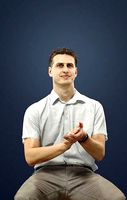 Romance Casual Caucasian Male Sitting And Clapping