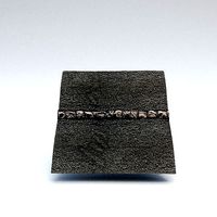 Tarmac and cobble stone ground material and texture