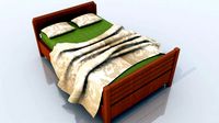 Bed with pillow and bed sheet