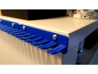 Wallmounted cable holder