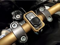 Garage door remote holder for motorcycle handlebars