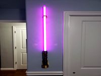 Savi's workshop lightsaber wall mount