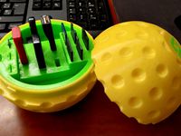 Desktop golf ball with usb, micro sd and sd holders.