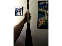 A fretless dulcimer strum stick