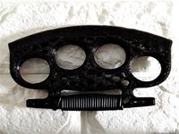 The "Eyebrow Re-Organizer" ( Brass Knuckles )