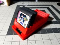 Flip Forward Sega Game Gear Cartridge Holder - Uses segments of 1.75mm filament as hinge pins