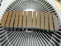 Articulated plate for manhole cover with hidden links