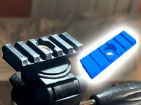 Camera tripod to Picatinny rail adapter (1/4 20 tpi)