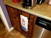 Drawer hand towel hanger