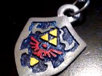 Hylian Shield Keychain/Necklace Charm by xAuSolarisx