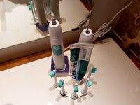 Five toothbrushes Sonicare stand