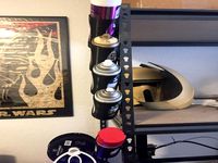 Keyhole Mounted Spray Can Holder