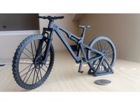 Mountain bike with articulated front and rear suspension