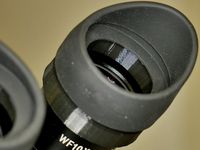 Eakins microscope extension for rubber eye-guards