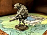 Man Carrying Bear Mini