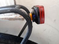 Bicycle pannier rack rear light mount