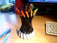 Hyperboloid pencil holder