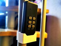 remote holder for round vertical handrail