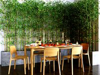 table setting with tangerines in bamboo